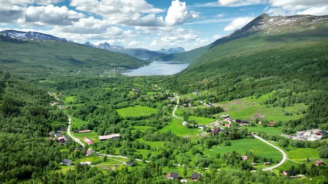 Aerial of a small town at the end of a fjord on the  amazing coastline of northern Norway.