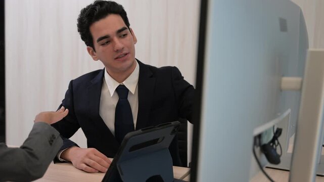 Diverse business team professional data analysts working together in office using tablet digital dashboard for financial marketing growth research. Expert colleagues analyzing corporate infographic ch