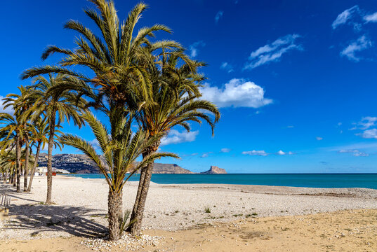 Panoramic view of Playa de Altea beach at the Mediterranean sea Costa Blanca shoreline with seafront Morro de Toix and Ilfach cliffs of Altea in Spain