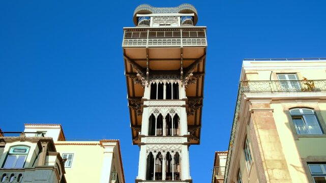 Santa Justa elevator and its cabin going up, Lisbon, Portugal on sunny