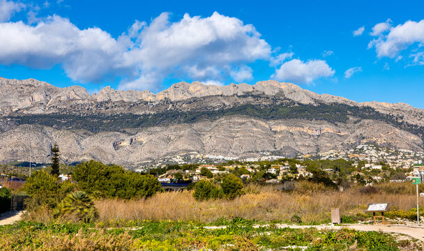 Panoramic view of Sierra de Bernia range, part of Cordilleras Beticas Baetic Mountains at Mediterranean Sea Costa Blanca shore seen from Altea town in eastern Spain