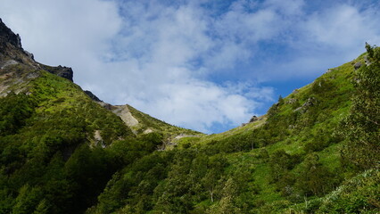 Obraz premium Hiking the Volcano: A Summer Ascent of Mount Yakedake, Nagano, Japan