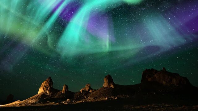 Aurora and Milky Way Galaxy Time Lapse Radiant Night Above Rocks