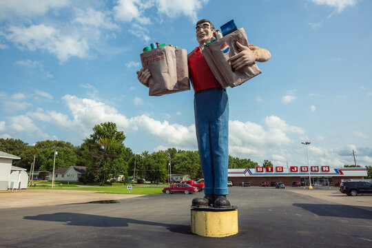 Vintage statue outside Big John&rsquo;s grocery supermarket in Eldorado, Illinois. Eldorado, Illinois, July 2021