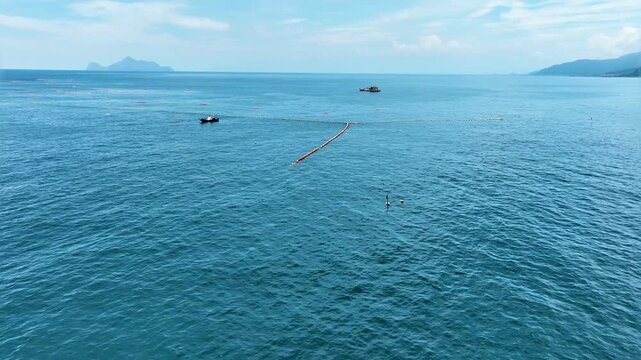 Aerial of a permanent fish nets off the coast of Taiwan.