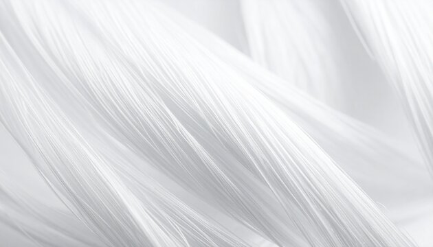 Abstract macro background featuring flowing white fibers with soft lighting to create a clean minimalist aesthetic for modern design projects.