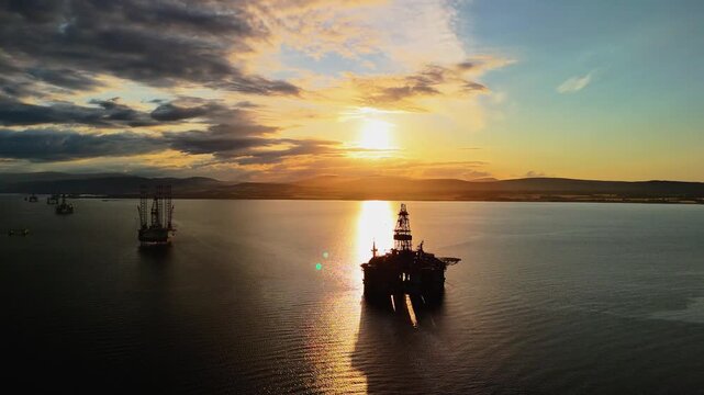sunset at cromarty oil rig graveyard