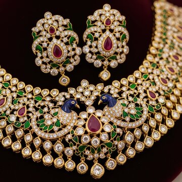 Exquisite Peacock Design Kundan Necklace and Earrings Set with Ruby and Emerald Accents.