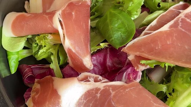 jamon salad mixed green salad leaves meat dish tasty snack fresh, delicious, gourmet food background rustic food on the table, top view, copy space