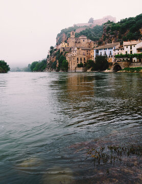 Ebro River and the town of Miravet shrouded in fog, Tarragona, Catalonia, Spain