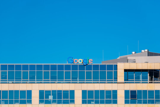 Wroclaw, Poland - March 16 2025: Colorful Google Logo on a Modern Glass Corporate Office Building in Wroclaw Poland Global Tech Company Signage and Contemporary Architecture in Urban Tech Hub