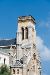 Fototapeta premium Biarritz Church and Buildings on a Cloudy Day