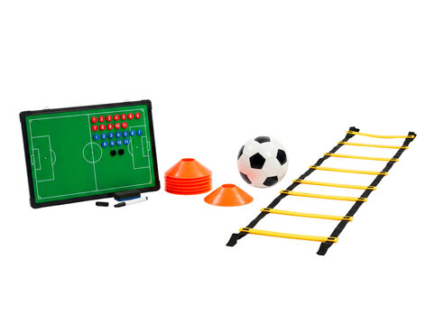 Soccer training equipment arranged and ready for a match or workout. The setup includes a soccer ball, cones, a ladder, and a tactical board showing strategy.