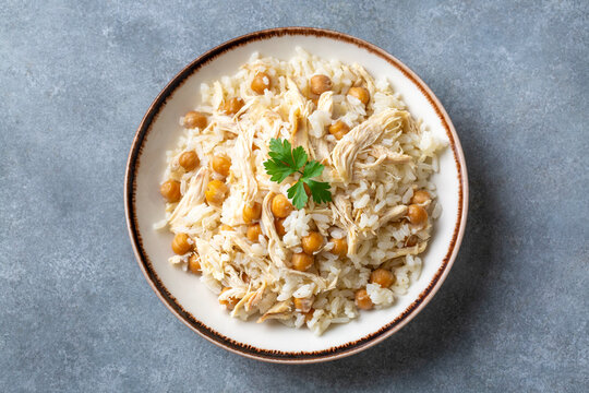Traditional delicious Turkish food; Rice with chickpeas and chicken (Turkish name; Tavuklu nohutlu pilav or pilaf)