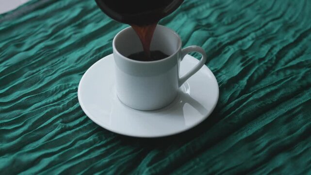 Turkish Coffee Close-up on Wrinkled Fabric Background