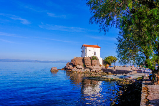 Lesvos Island - Greece, December 20, 2025. The little church of Panagia Gorgona situated on a rock in Skala Sykamias, a picturesque seaside village of Lesvos.