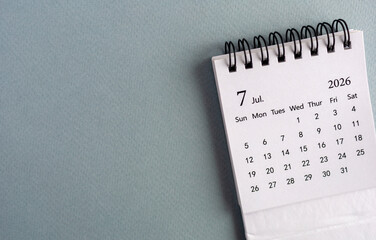 Desktop calendar for July 2026 on the desk. © Елена Николаева