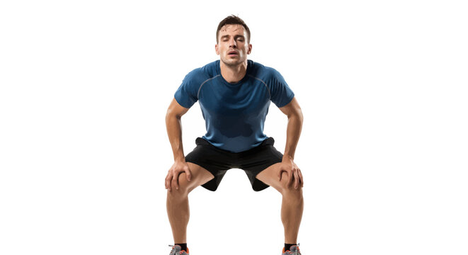 Man in blue shirt and black shorts doing squat exercise