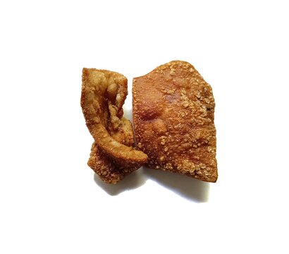 Traditional guatemalan crispy pork rinds chicharrones isolated on white background