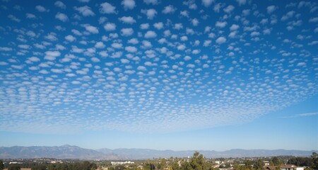 Fototapeta premium Small clouds and blue sky in California 