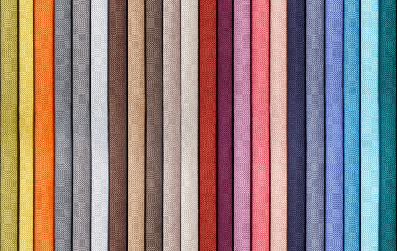 Seamless textures of colourful fabric samples arranged in a neat row. Each piece offers different colour suitable for decoration and design