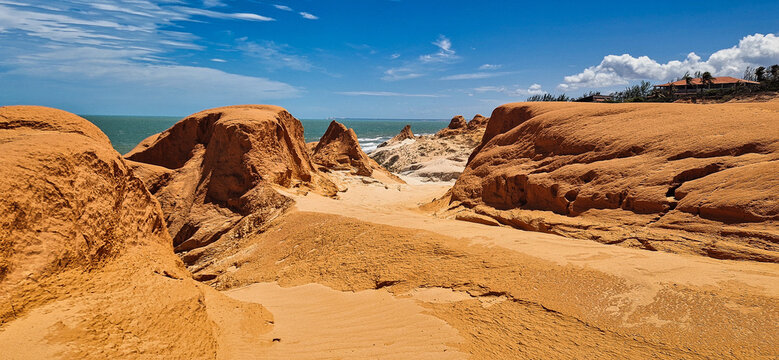 The rock formations at Canoa Quebrada Beach at Canoa Quebrada, state of Ceara, Brazil