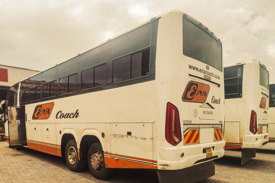 White and Red ENA Coach Bus Parked at Baraka Rift Stop Over on Nairobi-Nakuru Highway, Kenya