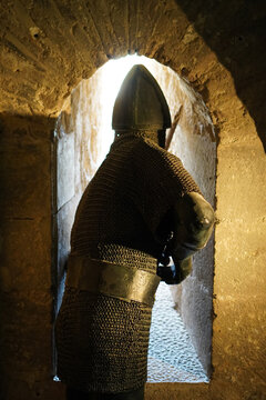 medieval soldier with chain mail in the espolon tower, in the castle of lorca