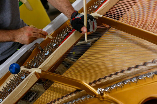 Piano tuning and repair in progress