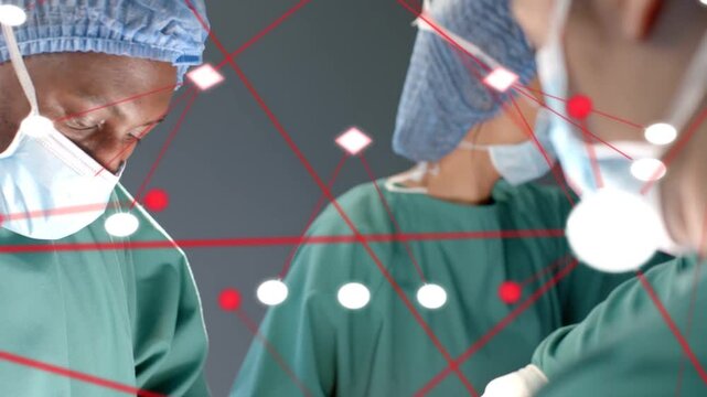 Diverse surgical team performing surgery in OR in gowns masks gloves, overlay moving, copy space