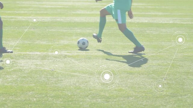 Green duo tapping ball, dribbling, passing in soccer drill while HUD tracks and red defender closes