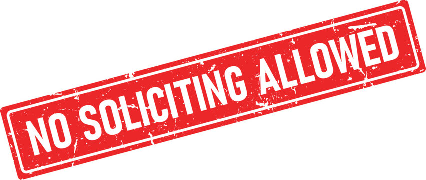 A clear red distressed ink rubber stamp impression boldly declaring the important message NO SOLICITING ALLOWED