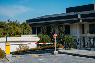 Secure Parking Access. Contemporary Parking Zone Featuring Security Barriers And Automated Sensors © Yashkin Ilya