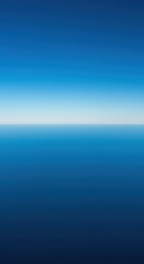 Obraz premium Intense blue atmosphere above a clean, clear horizon line. The sunlight creates a dramatic, sharply defined separation of color and light, light, outdoor, clear
