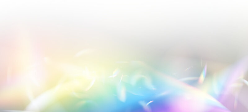 Abstract neon prism light on transparent PNG background. Soft holographic rainbow flare and refraction glow overlay. Crisp vector crystal glow sparkle accents.