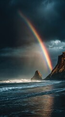 Naklejka premium Dramatic Rainbow Over Rocky Coastline at Sunset