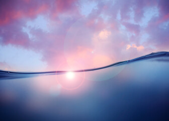 Clean water under beautiful sky with clouds and sun © New Africa