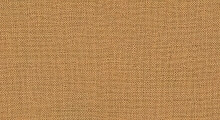 Fototapeta premium Close-up texture of golden woven burlap fabric background with natural fibers