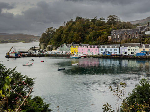 View of the beautiful Portree Harbour  and town, with Colorful Houses, Isle of Skye Scotland &ndash; Scenic Coastal Village Landscape