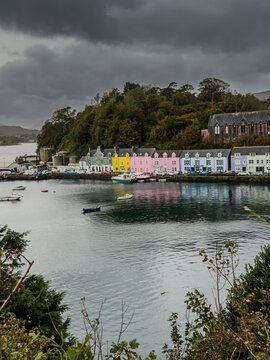View of the beautiful Portree Harbour  and town, with Colorful Houses, Isle of Skye Scotland &ndash; Scenic Coastal Village Landscape