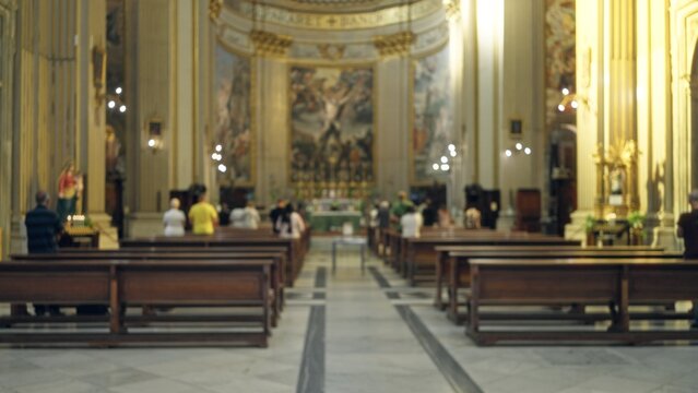 Interior church nave defocused backplate with pews, altar and columns rendered in soft shallow blur; background backdrop copyspace calm.