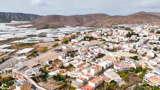 city aerial texture mountain industry field agriculture greenhouse invernaderos rural country town drone plastic sea building landscape house home housing dry land - Dal&iacute;as, Andalusia, Spain - 2025