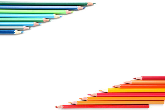 Frame made of color pencils on white background