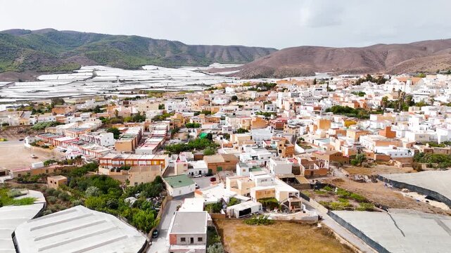 rural town aerial drone mountain vacation travel urban nature view building sunlight texture city horizon country greenhouse invernaderos view - Dal&iacute;as, Andalusia, Spain - 2025