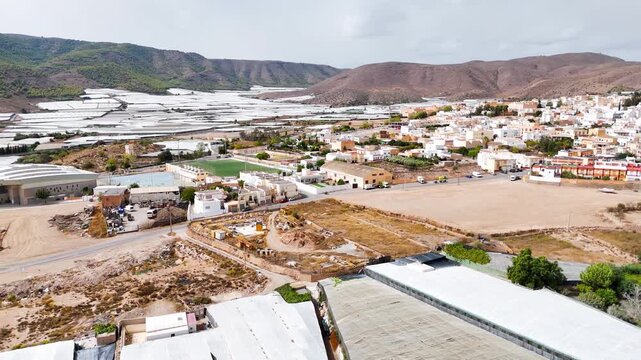 greenhouse plastic sea invernaderos country wasteland mountain agriculture modern industry town travel drone aerial view dry nature environement - Dal&iacute;as, Andalusia, Spain - 2025