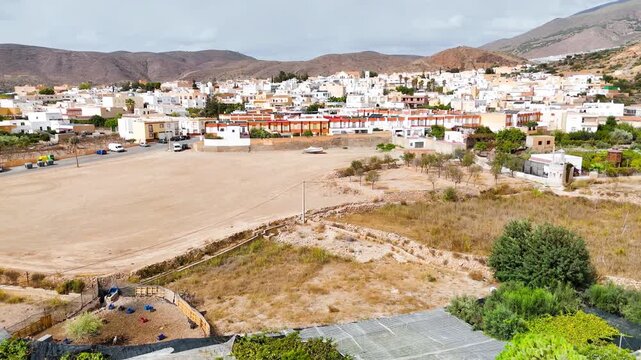 dry landscape town wasteland drone aerial travel environment mountain horizon city urban building house white housing home nature border vacation - Dal&iacute;as, Andalusia, Spain - 2025
