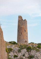 Obraz premium Old Coastal Watchtower Torre del Colomer – Mediterranean Historic Defense Architecture