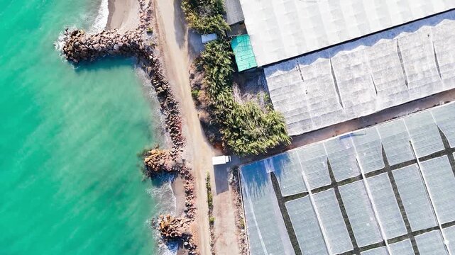 plastic sea coastline road drone view aerial roof greenhouse architecture beach building industry agriculture invernaderos pier water - Andalusia, Spain - 2025