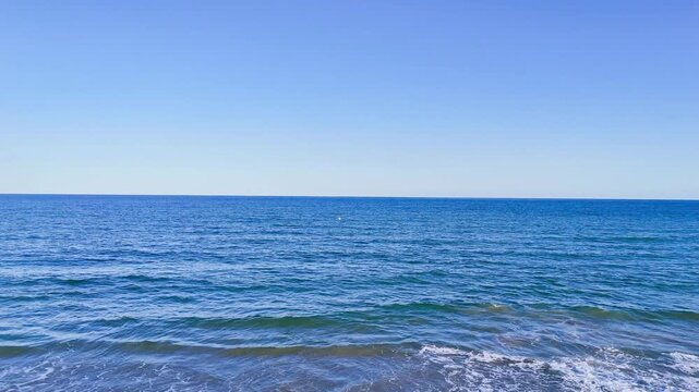 blue sea perfect horizon gradient design vacation wave travel minimal drone aerial skyline texture flying - Guardamar del Segura, Alicante, Spain - 2025