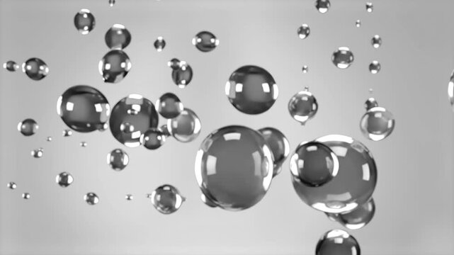 A high-quality 3D render of glossy, reflective metallic spheres of various sizes floating in mid-air. The background is a clean, bright minimalist white, which emphasizes the sharp reflections and chr
